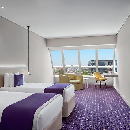 Leva Hotel Mazaya Centre Дубай Экстерьер фото